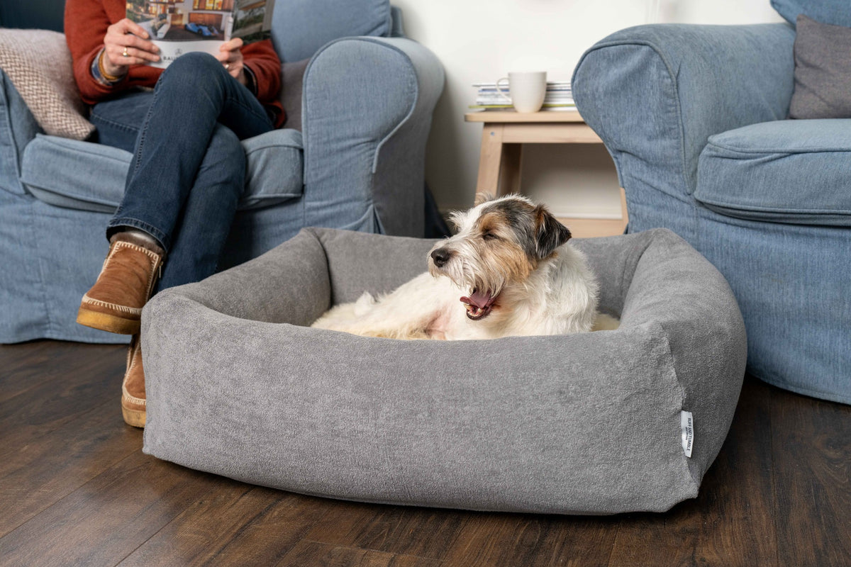 Ruff & Tumble Burnham Bolster Towelling Bed Cover in Stone with dog