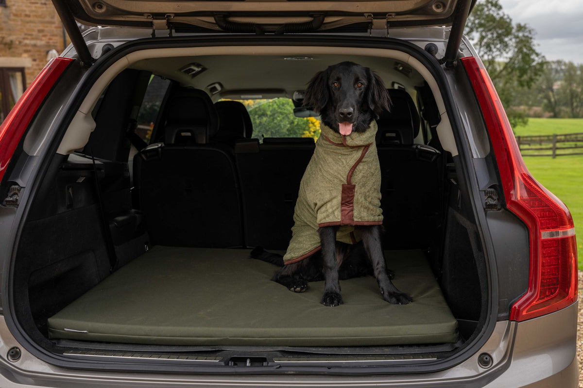 Dog using Ruff & Tumble Crate Mat Boot Bed in Olive