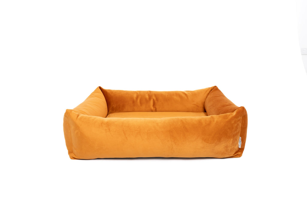 Velvet Burnham Bolster Dog Bed in Burnt Orange